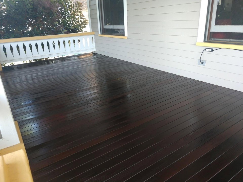 Deck boards after application of a rich dark stain